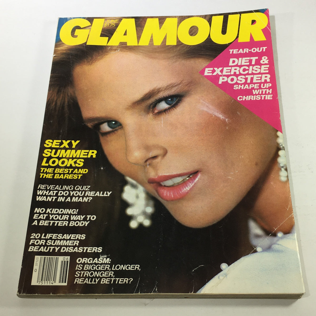 Cover of VTG Glamour Magazine: June 1983 featuring Christie Brinkley, showcasing early 80s fashion trends with bold colors and styles.