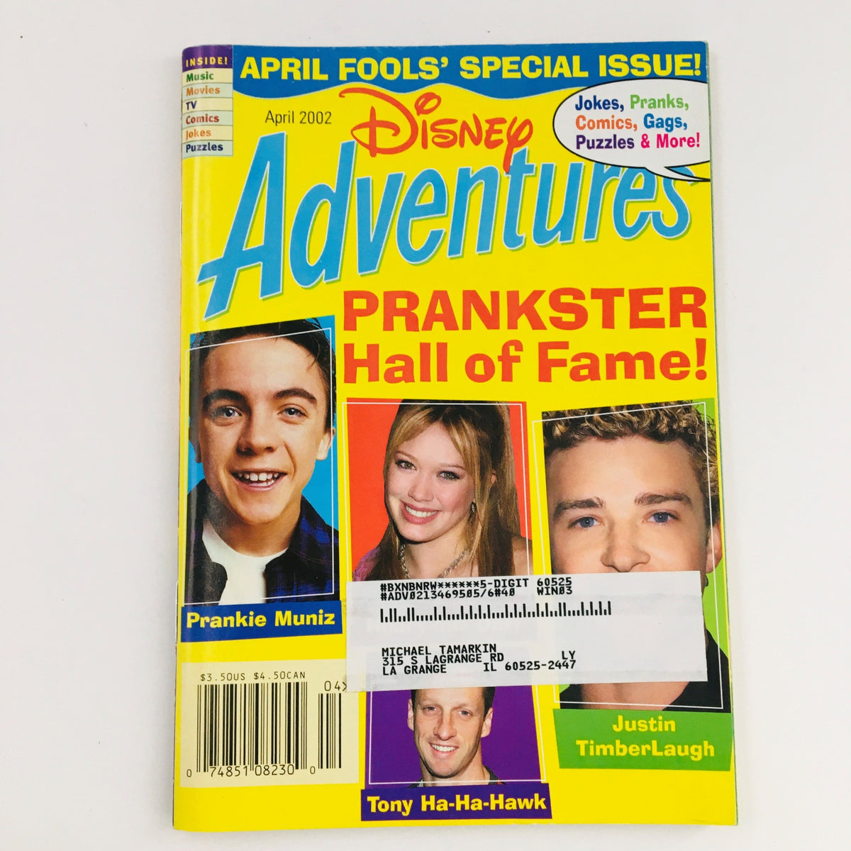 Disney Adventures Magazine April 2002 featuring Frankie Muniz, Hillary Duff, Tony Hawk, and Justin Timberlake on the cover, showcasing a nostalgic collectible from early 2000s pop culture.