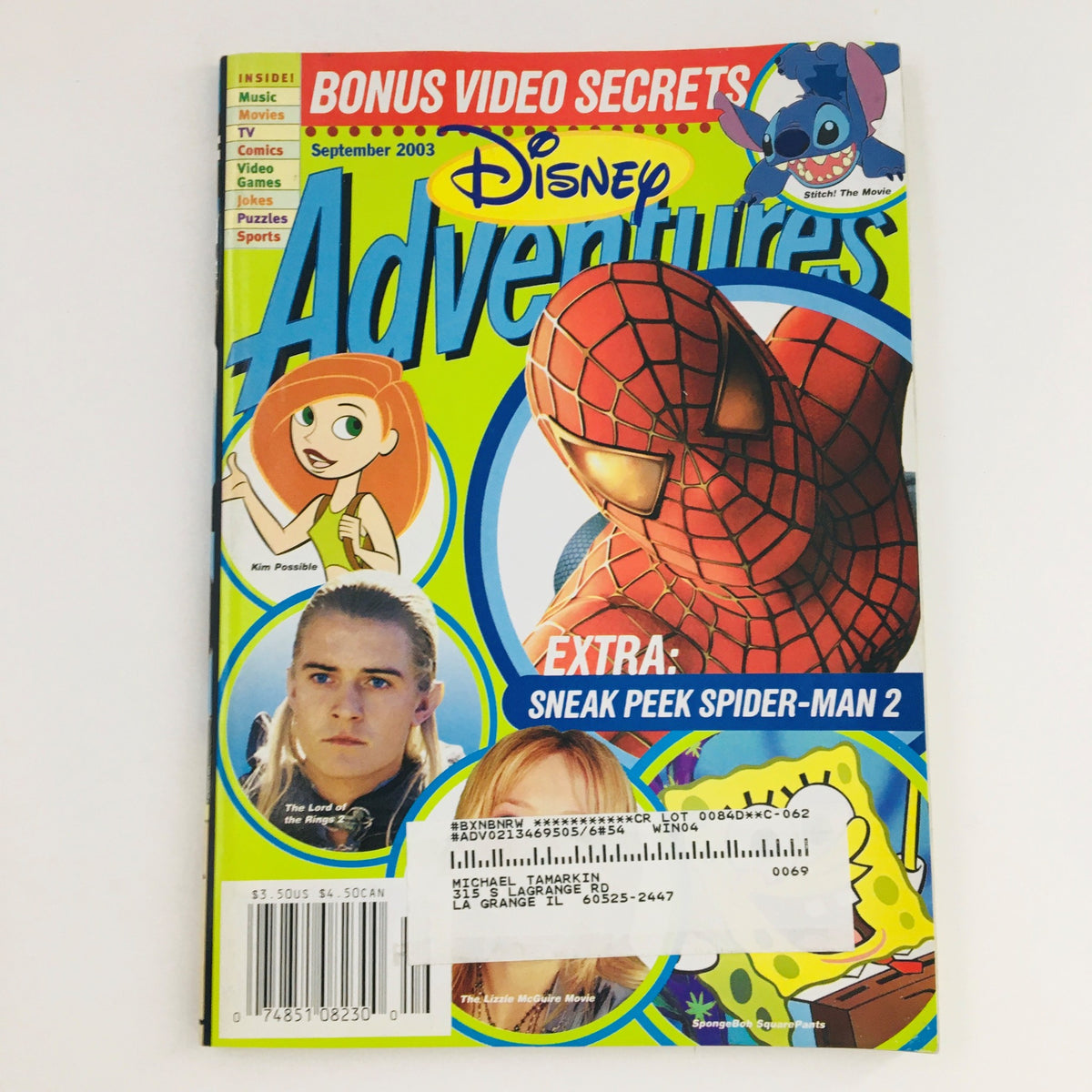 Cover of Disney Adventures Magazine from September 2003 featuring characters like Spiderman, with a mention of bonus video secrets and a sneak peek at Spider-Man 2, showcasing the vibrant style and design that highlights popular Disney content from that era.