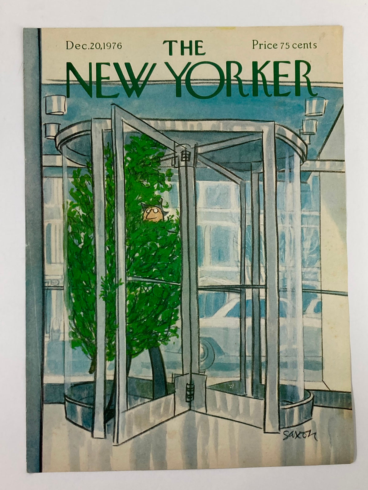 COVER ONLY The New Yorker December 20 1976 My Tree by Charles Saxon. This image showcases the same iconic cover art of a revolving door and a festive tree, highlighting its nostalgic charm.