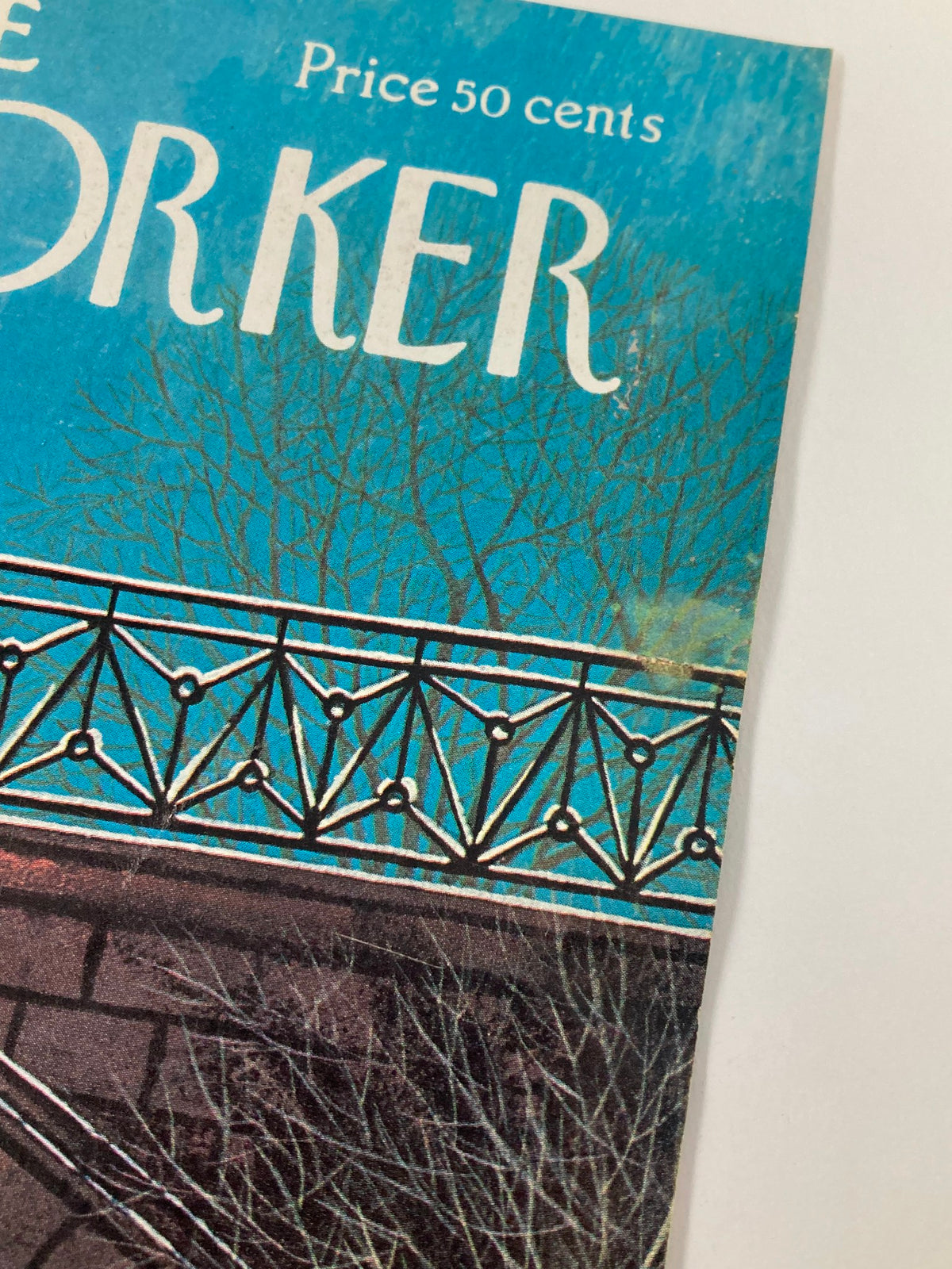 CLOSE-UP detail of The New Yorker cover January 7 1974 showing the corner with date and title, emphasizing the vintage condition and artistic features of 'Footprints' by Charles Martin.