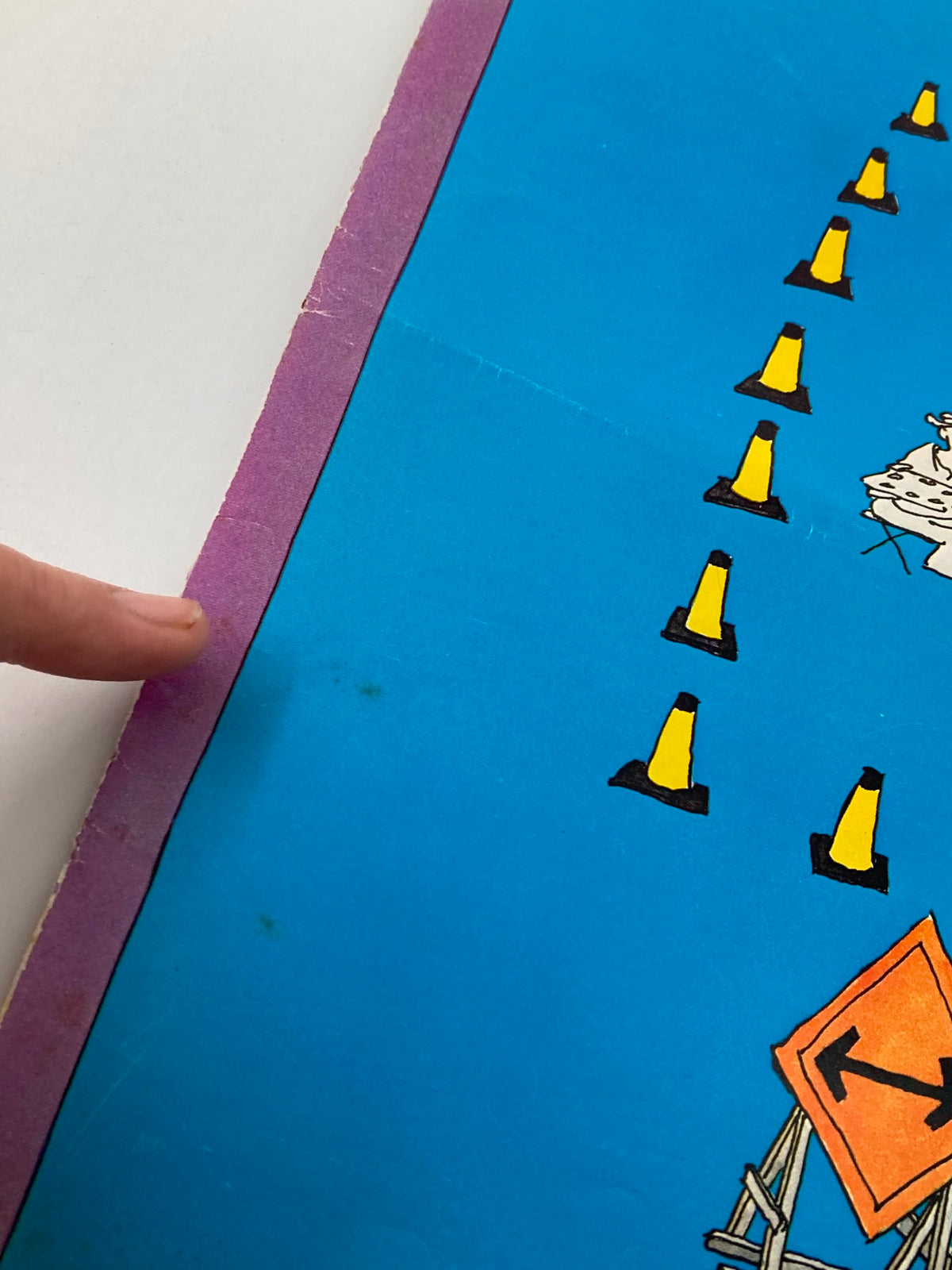 Close-up detail of the spine of The New Yorker magazine cover, October 10, 1977, highlighting the vintage design and colors of the artwork 'Dead End' by Heidi Goennel.