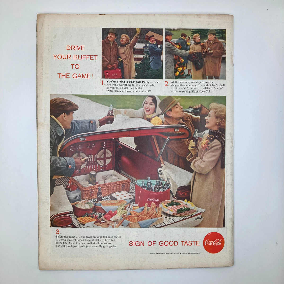 Back cover of Saturday Evening Post Magazine, October 25, 1958, advertising Coca-Cola with a festive scene of people enjoying a football party and delicious food.