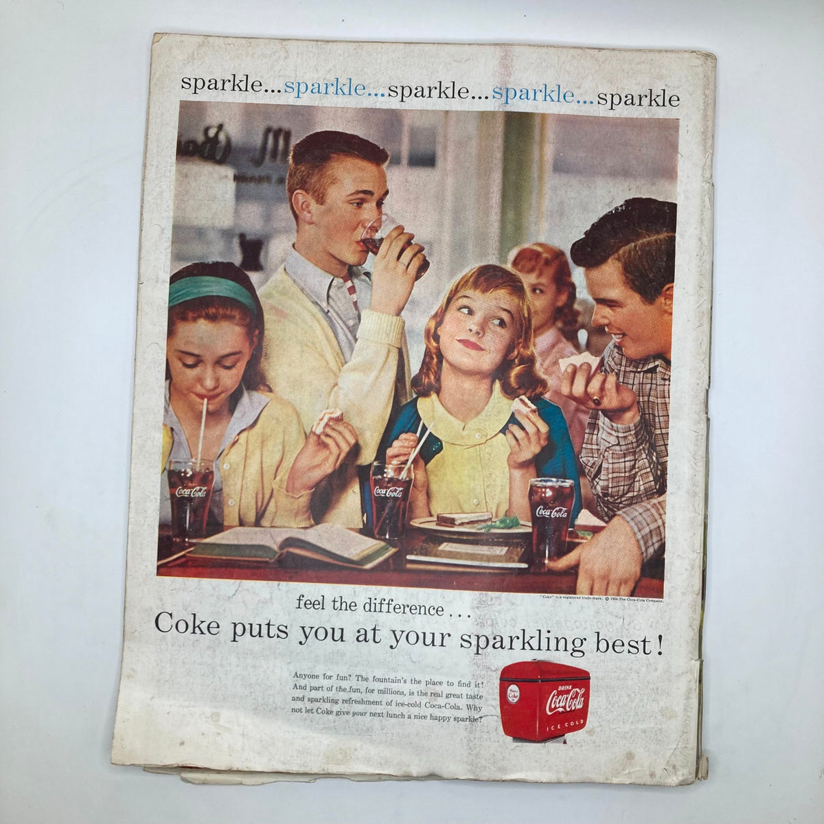 Back cover of the September 29, 1956 Saturday Evening Post magazine featuring a Coca-Cola advertisement with children enjoying beverages.