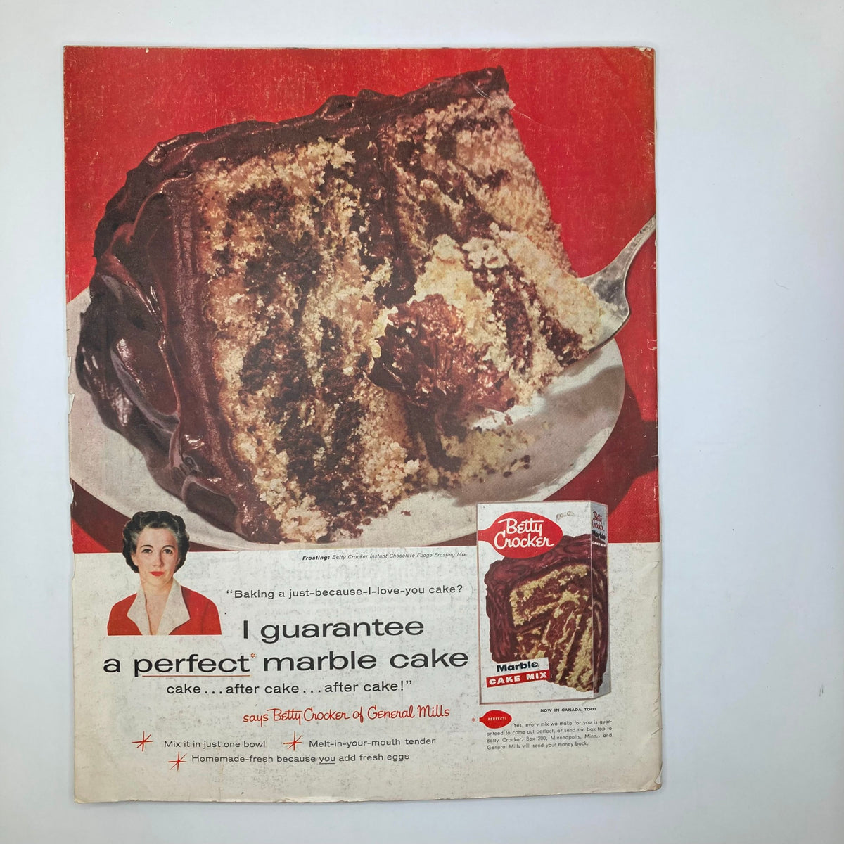 Betty Crocker advertisement featuring a delicious marble cake with the text 'I guarantee a perfect marble cake' from the Saturday Evening Post Magazine November 2 1957.