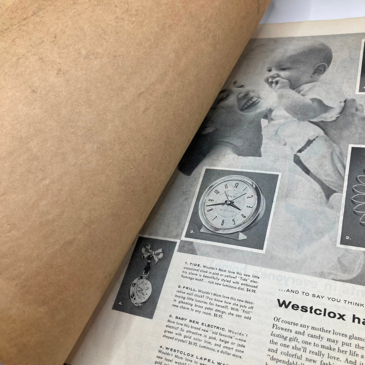 Inside page of Saturday Evening Post Magazine, April 27, 1957, featuring vintage advertisements including a clock and a jewelry item, highlighting the nostalgic design and layout from the mid-20th century.