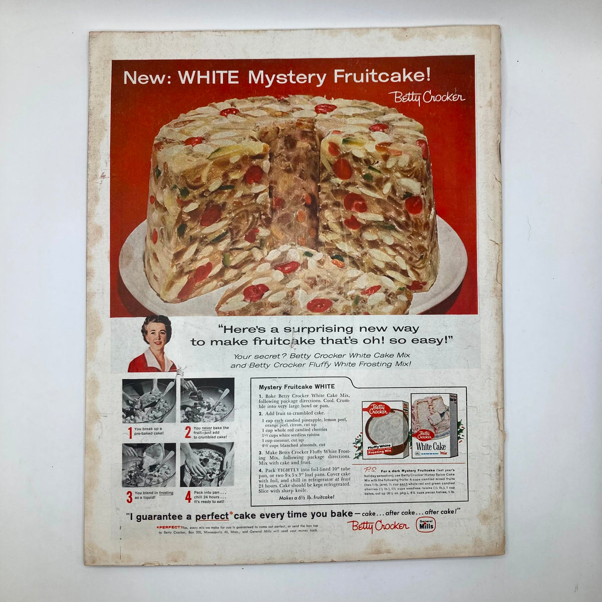Advertisement for Betty Crocker’s NEW WHITE Mystery Fruitcake in the Saturday Evening Post Magazine, December 13, 1958.