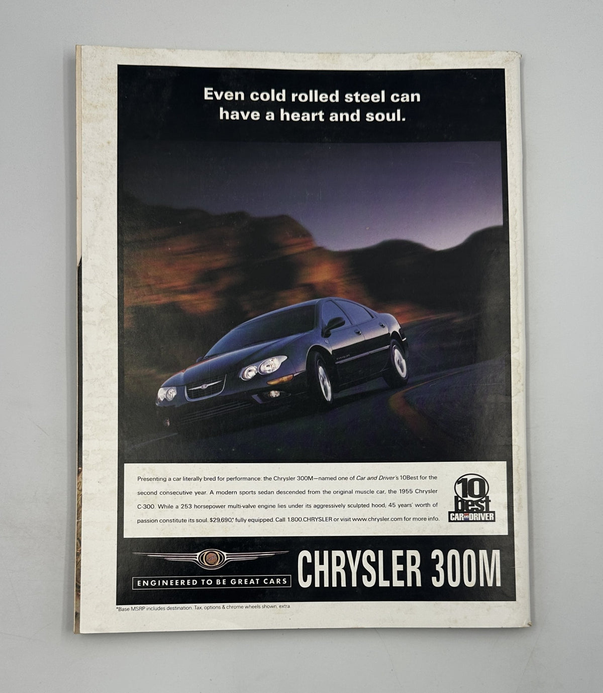 Back cover of Time Magazine December 31, 1999 featuring an advertisement for the Chrysler 300M, with a focus on the car's performance and design.