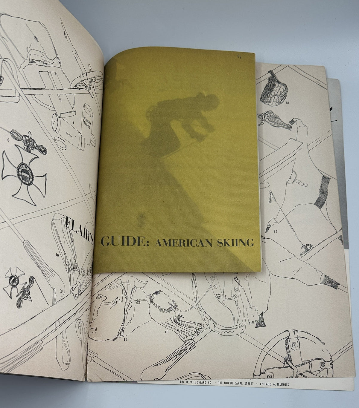 Flair Magazine November 1950 featuring a partial page view of American Skiing with illustrated skiers and ski equipment.