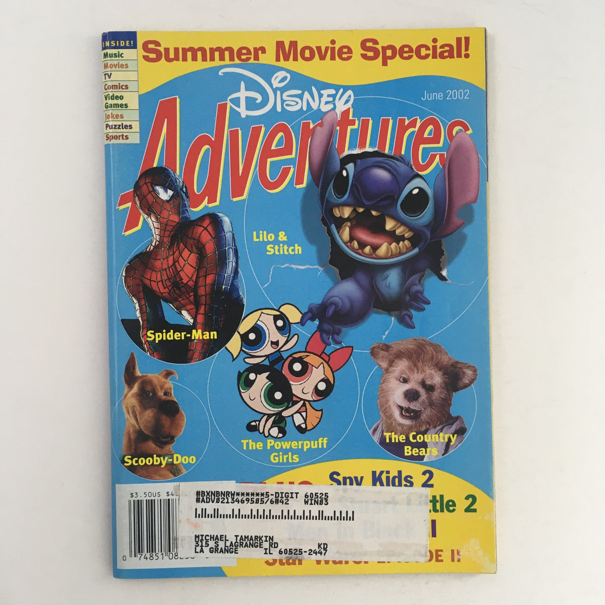 Disney Adventures Magazine June 2002 cover featuring Spider-Man, Scooby-Doo, Lilo & Stitch, and other characters. A nostalgic vintage magazine capturing early 2000s pop culture.