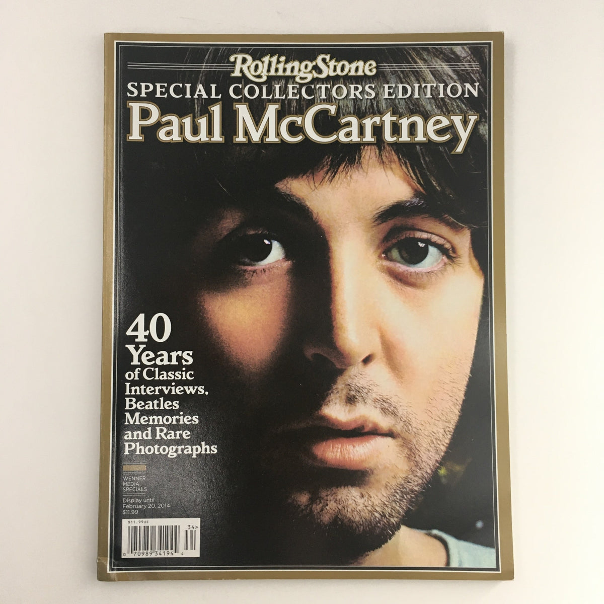 Rolling Stone 2014 Paul McCartney 40 Years Classic Interviews magazine cover featuring a close-up photo of Paul McCartney, highlighting his iconic features and reflecting the essence of rock and roll.