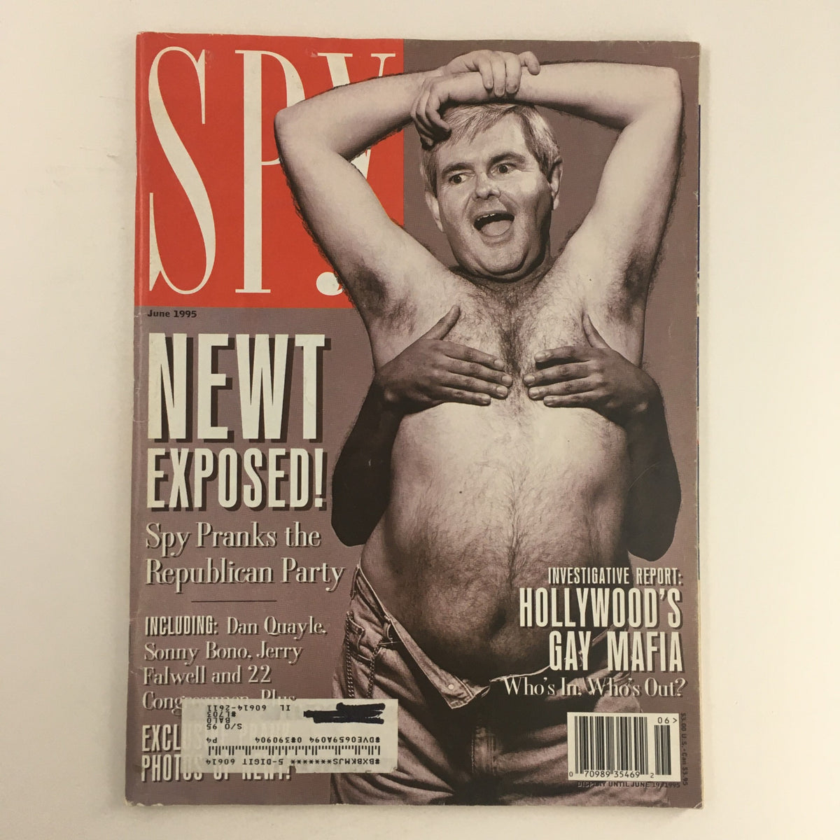 Cover of Spy Magazine from June 1995 titled 'Spy Magazine June 1995 Hollywood's Gay Mafia & Spy Pranks the Republican Party', featuring a humorous depiction of a man with a playful pose, reflecting the edgy culture and satire of the 90s.