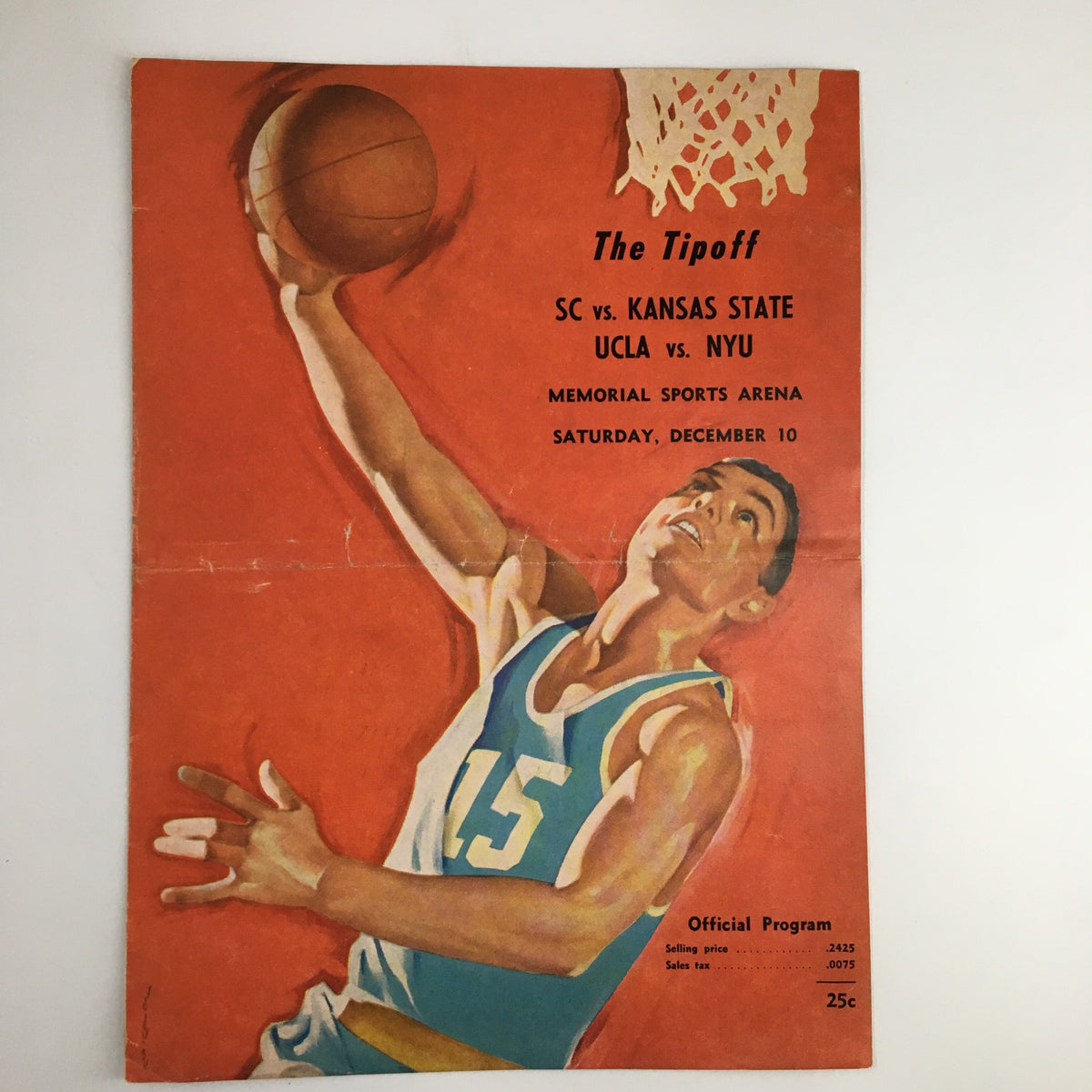 Cover of the December 10, 1961 NCAA Basketball UCLA vs NYU The Tipoff Official Program featuring a player in action with vibrant colors.