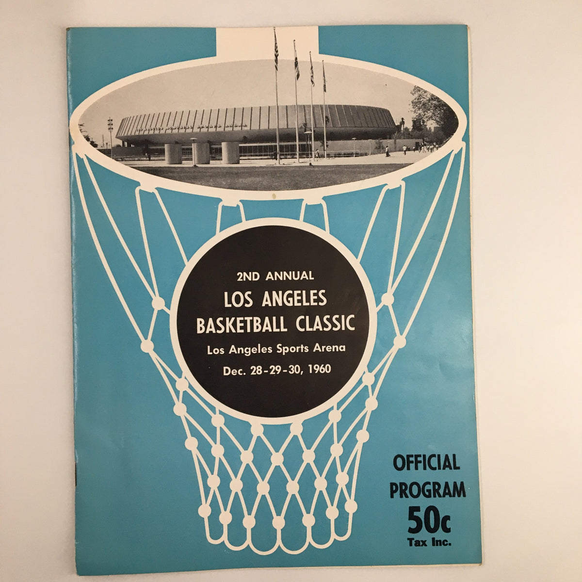 December 28 1960 NCAA UCLA Bruins Los Angeles Basketball Classic Program cover featuring a basketball net design, with the Los Angeles Sports Arena in the background, promoting the event dates of December 28-30, 1960.