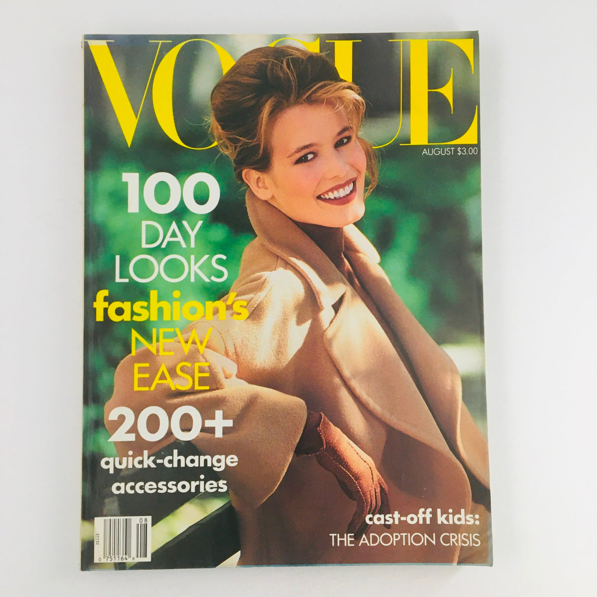 Vogue Magazine August 1990 cover featuring German model Claudia Schiffer, highlighting fashion trends of the 90s.