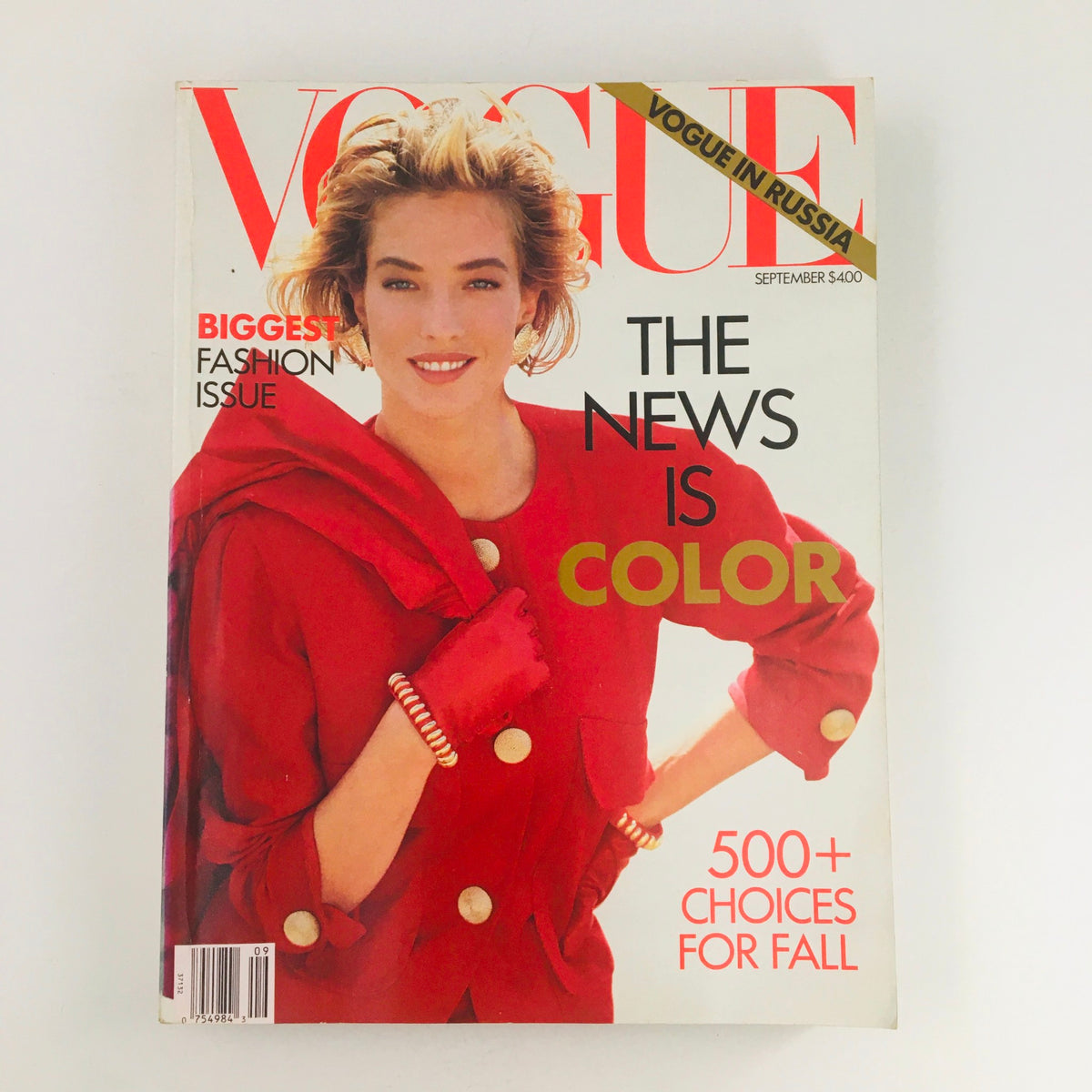 Vogue Magazine September 1990 featuring German model Tatjana Patitz on the cover, showcasing vibrant fashion trends with bold colors in a stylish editorial presentation.