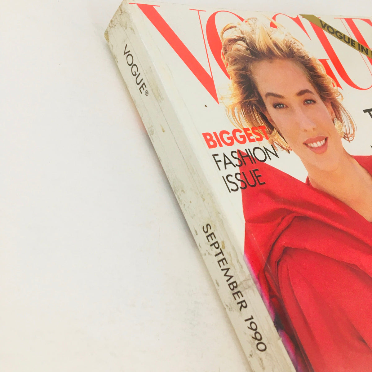 Close-up view of Vogue Magazine September 1990 displaying its spine and cover details, highlighting the iconic German model Tatjana Patitz, part of the biggest fashion issue.