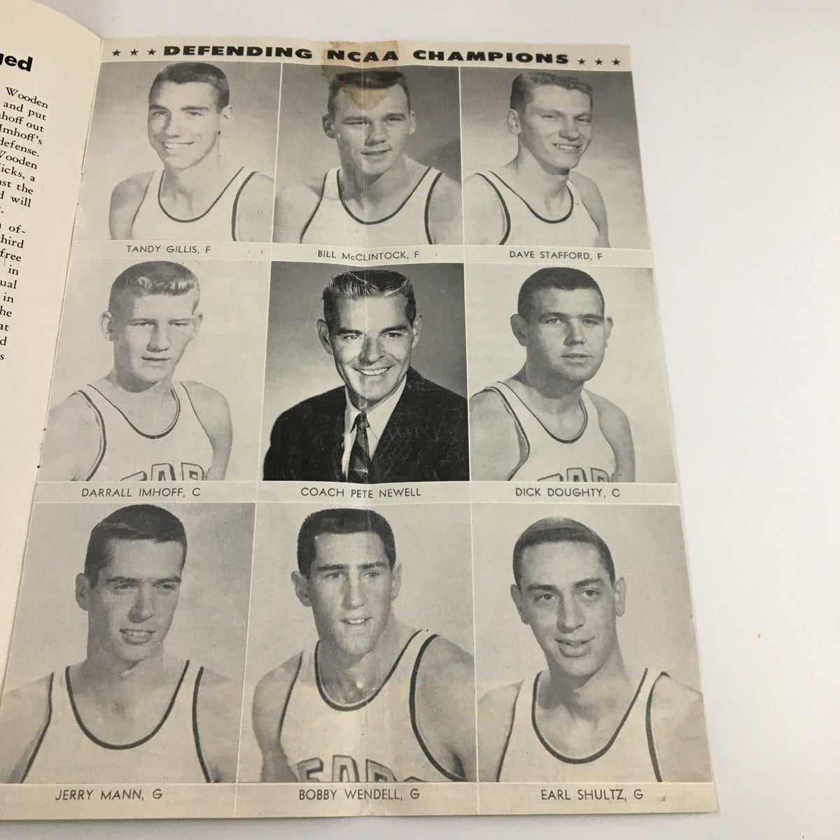 Inside page of the 1960 UCLA Bruins USC Trojans Basketball Program featuring the roster and image of Coach Pete Newell and team players.
