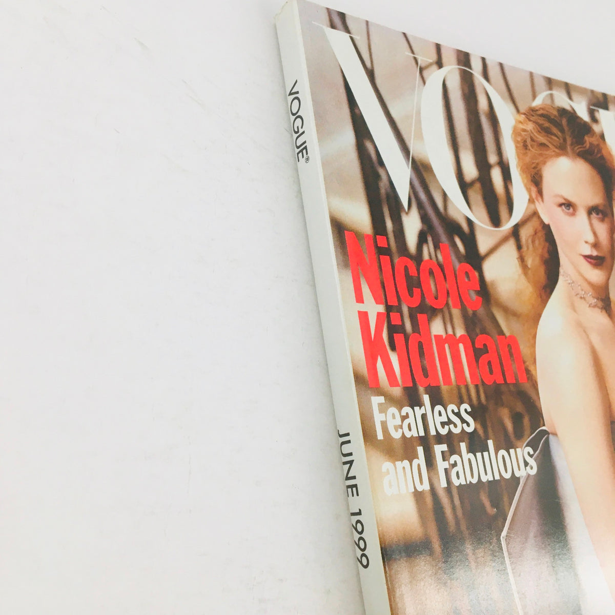 Side view of Vogue Magazine June 1999 with Nicole Kidman on the cover, highlighting the title 'Fearless and Fabulous' along with the issue date.