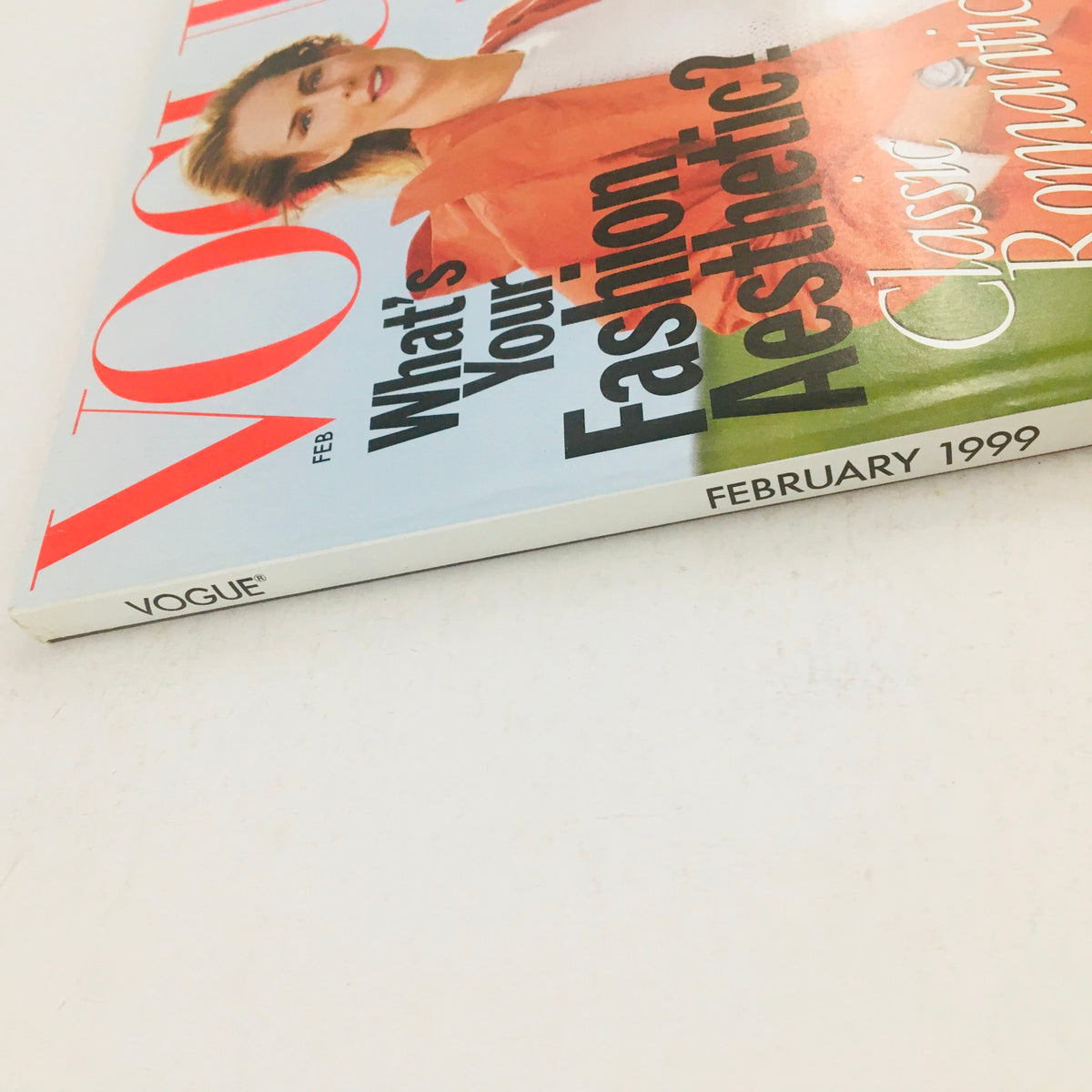 Cover of Vogue Magazine February 1999 featuring British model Stella Tennant, showcasing bold fashion and elegant design.