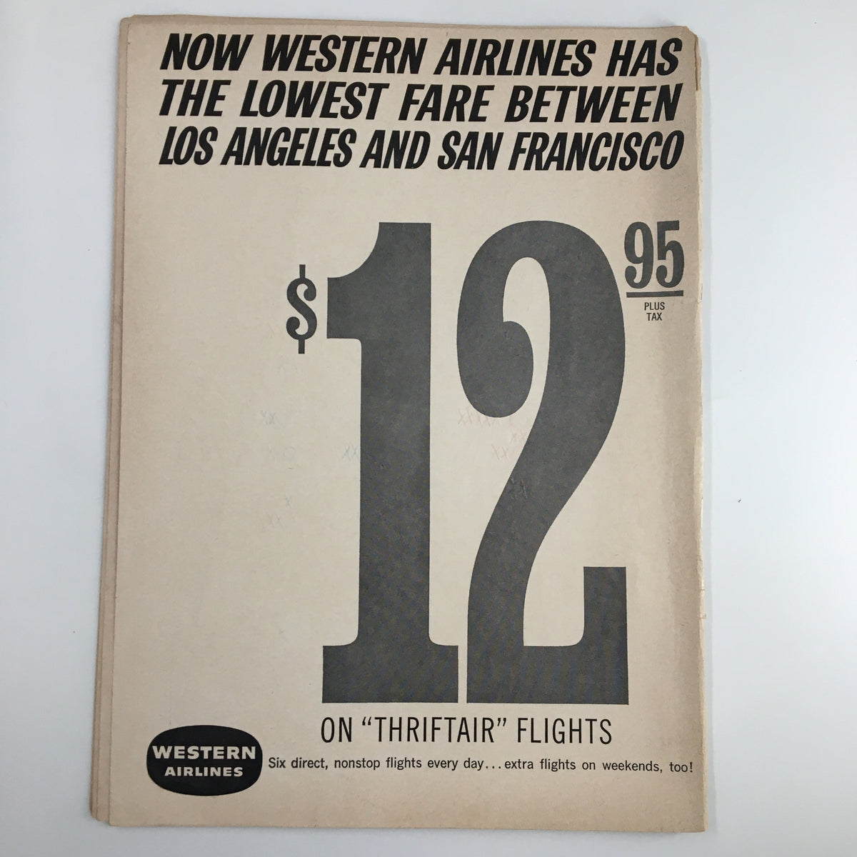 Back cover of the December 1, 1962 NCAA Basketball game program advertising Western Airlines with the slogan about low fares between Los Angeles and San Francisco.