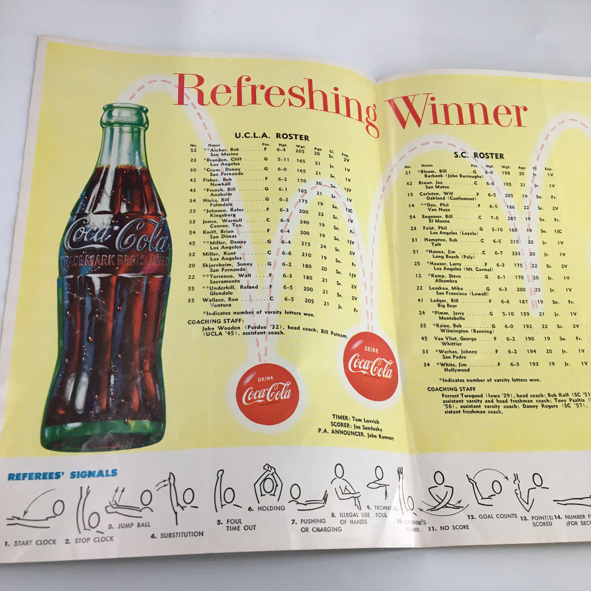 Inside page of the December 12, 1960 NCAA Basketball UCLA vs Kansas Official Program featuring U.C.L.A. roster and a Coca-Cola advertisement.