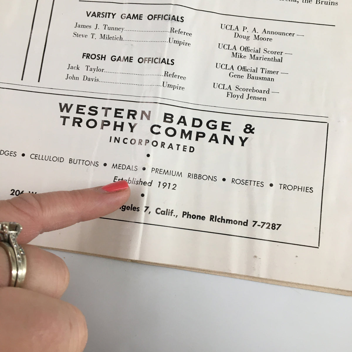 Close-up of the Western Badge & Trophy Company advertisement from the February 23 1962 NCAA Basketball California vs UCLA Official Program.