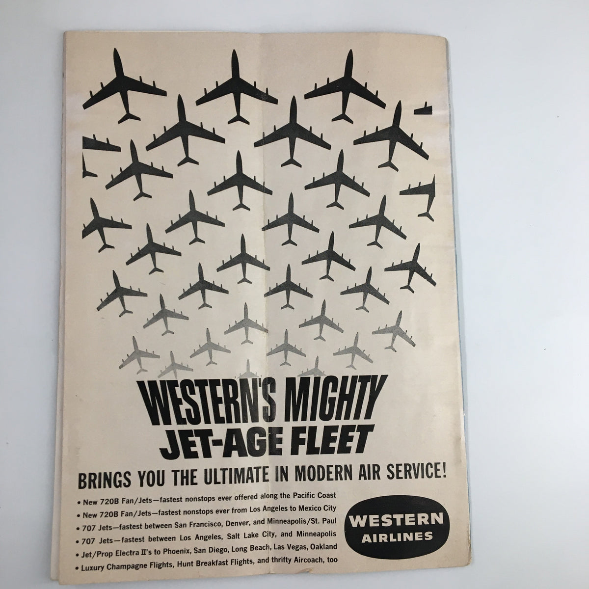 February 23 1962 NCAA Basketball California vs UCLA The Hoop Official Program highlighting an advertisement for Western Airlines featuring a fleet of airplanes in flight.