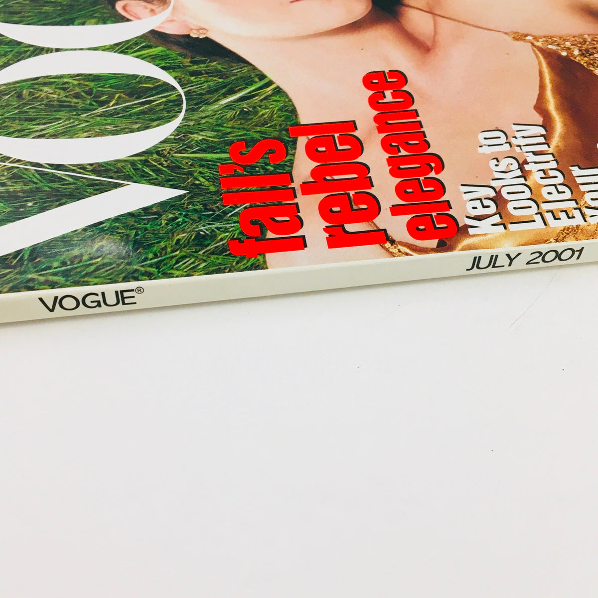 Close-up shot of the spine of Vogue Magazine July 2001, emphasizing the issue title with the phrase 'falls rebel elegance' prominently displayed.