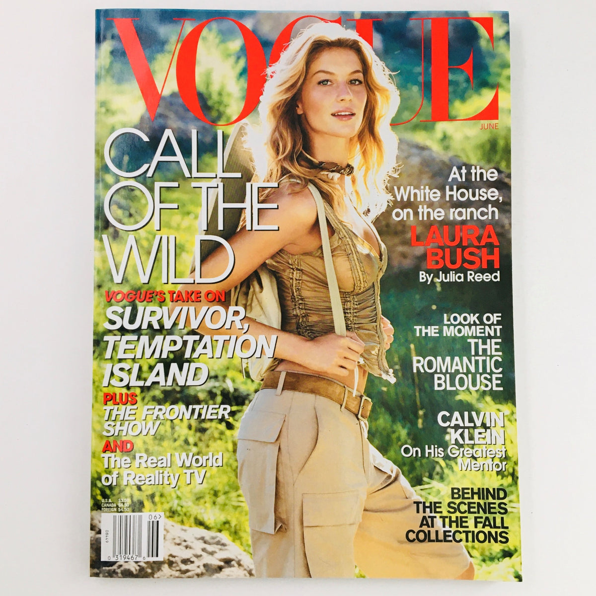 Vogue Magazine June 2001 cover featuring Brazilian model Gisele Bündchen styled for summer fashion, highlighting the issue's theme 'Call of the Wild'.