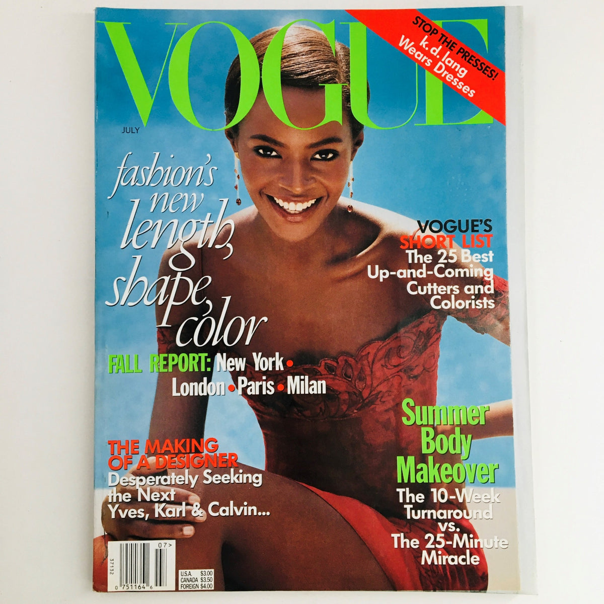 Vogue Magazine July 1997 cover featuring Ugandan-American model Kiara Kabukuru, showcasing fashion's new length, shape, and color. The magazine highlights fashion trends and designer profiles of the era.