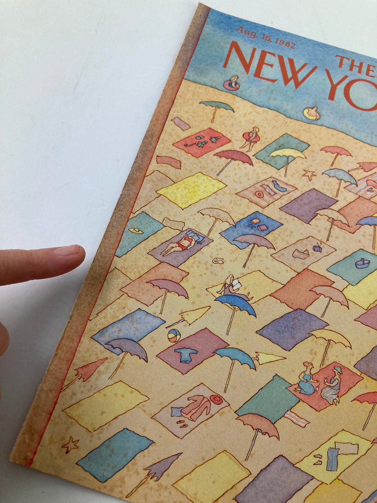 Cover of The New Yorker magazine dated August 16, 1982, featuring a colorful beach scene illustration by L.S. Johnson, depicting umbrellas and beachgoers in a vintage art style.