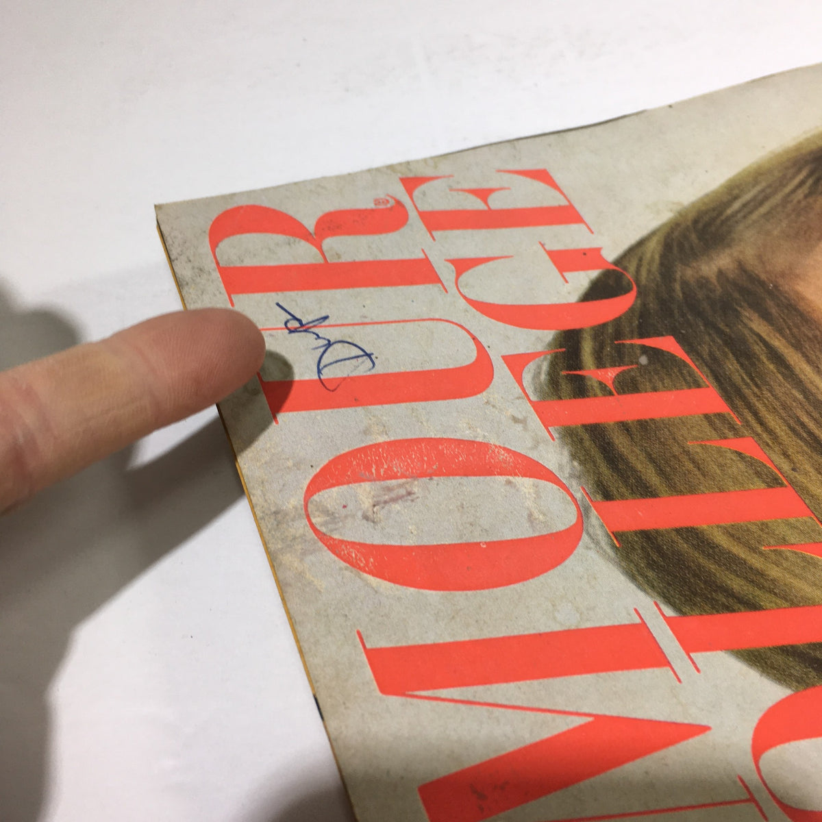 Close-up of the VTG Glamour College magazine cover from August 1967, highlighting a handwritten signature and showing wear typical of vintage publications.