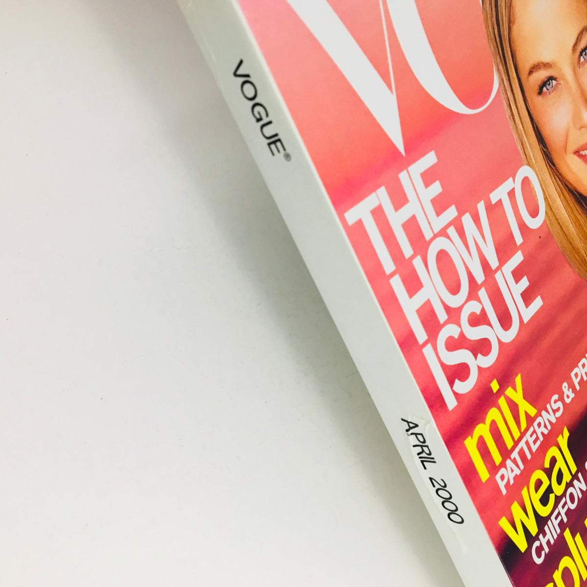 Close-up view of Vogue Magazine April 2000 spine, highlighting the title and date, emphasizing its vintage appeal.