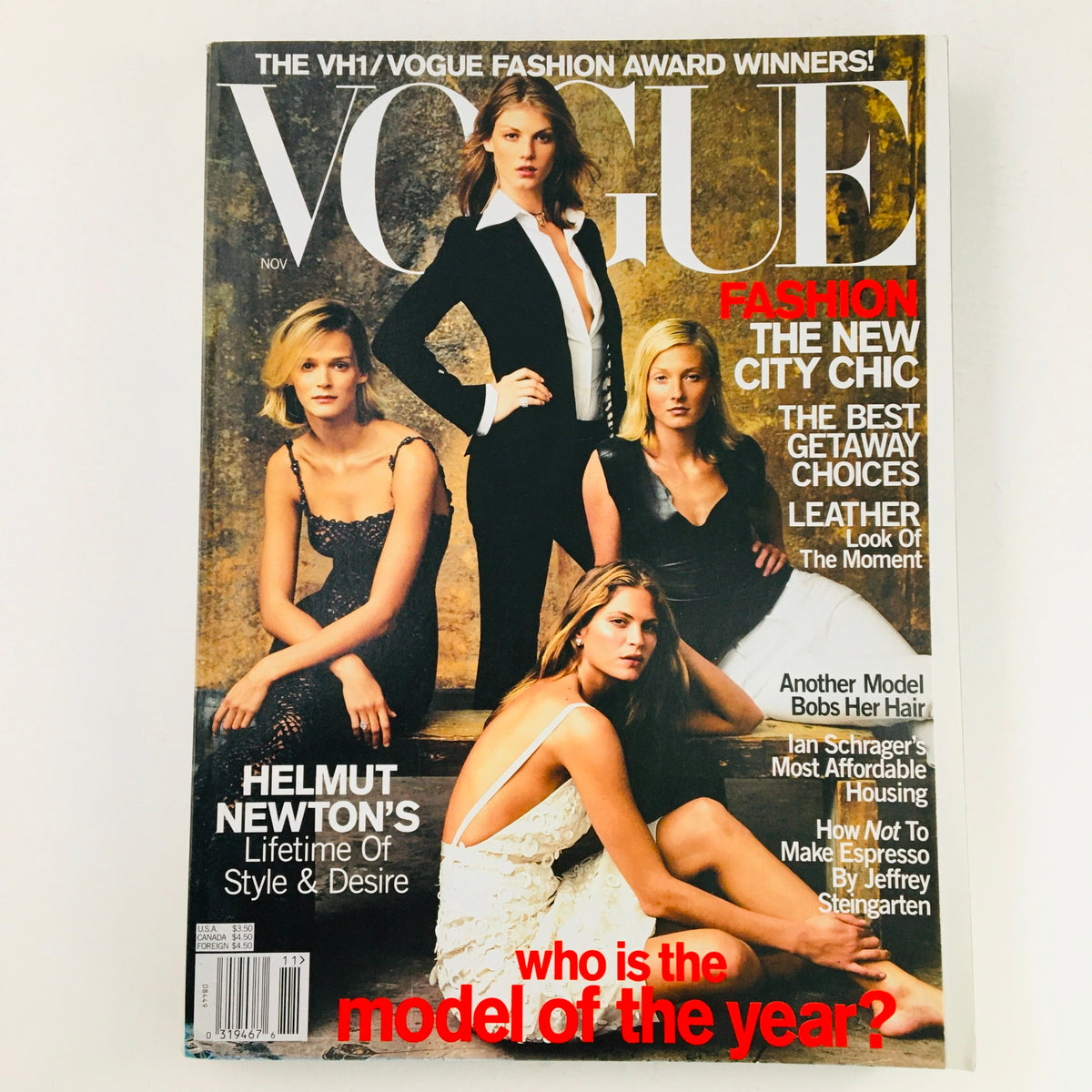Cover of Vogue Magazine November 2000 featuring models Kristy Hume and Helmut Newton, showcasing early 2000s fashion trends, distinctive poses, and a blend of elegance and style.