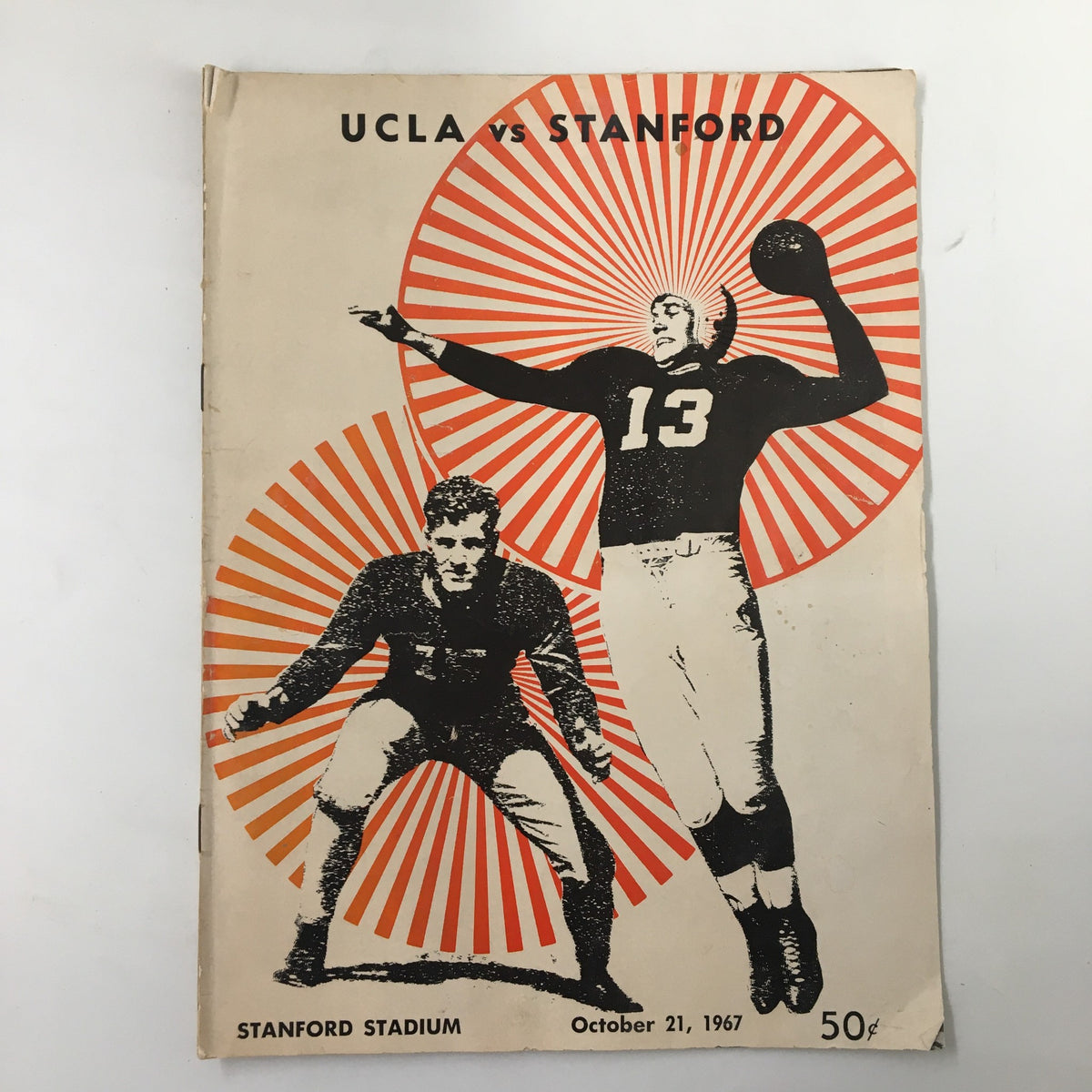 Cover of the October 21, 1967 NCAA Football program featuring UCLA Bruins vs Stanford Cardinal with a graphic design showcasing key players.