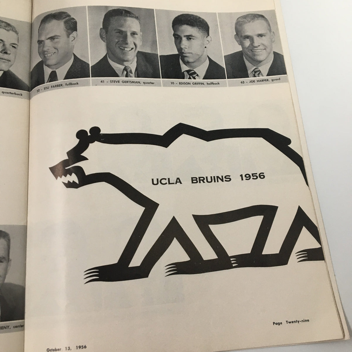 Inside the 1956 UCLA Bruins The Goal Post Official Program displaying player headshots alongside the bear logo.