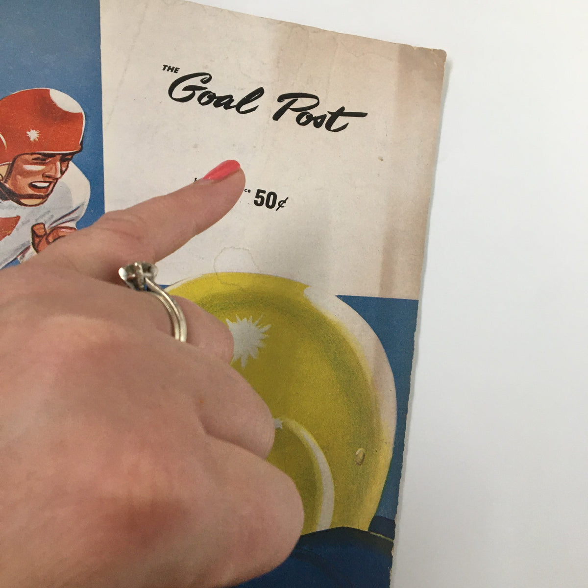Close-up of the top section of the September 27, 1957 NCAA Football Official Program 'The Goal Post', highlighting the title and price marking.