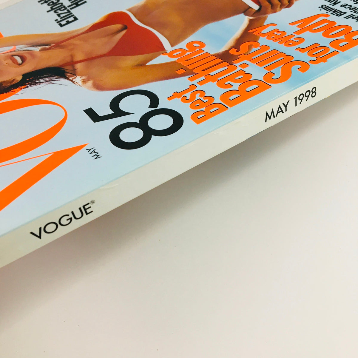 Side view of Vogue Magazine May 1998 with Elizabeth Hurley, highlighting the title and issue number, a vintage collectible reflecting 1990s fashion trends.