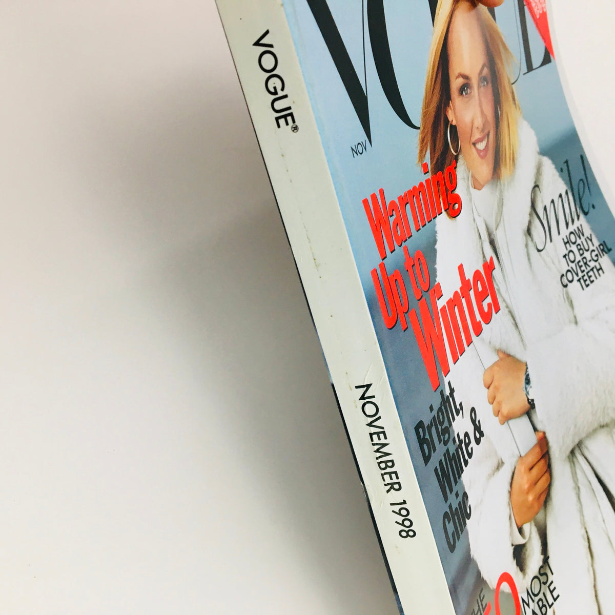 Spine of Vogue Magazine November 1998 showcasing the issue title and publication date, emphasizing its vintage appeal.