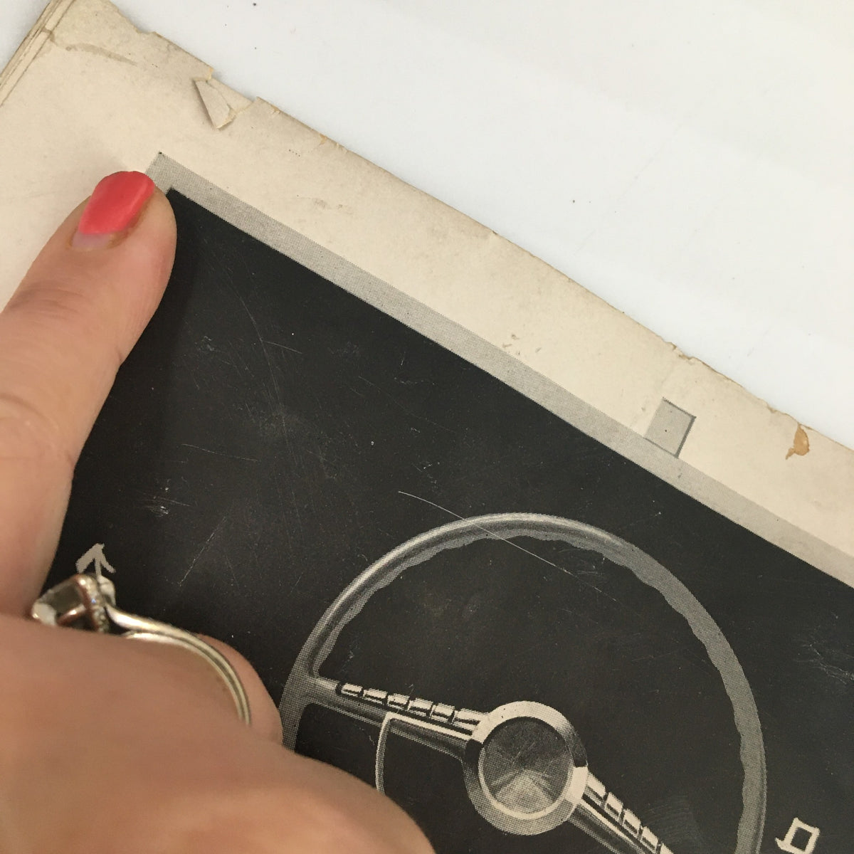 Close-up of the top edge of the September 20 1963 NCAA Football Pitt vs UCLA The Goal Post Official Program highlighting slight wear and tear.