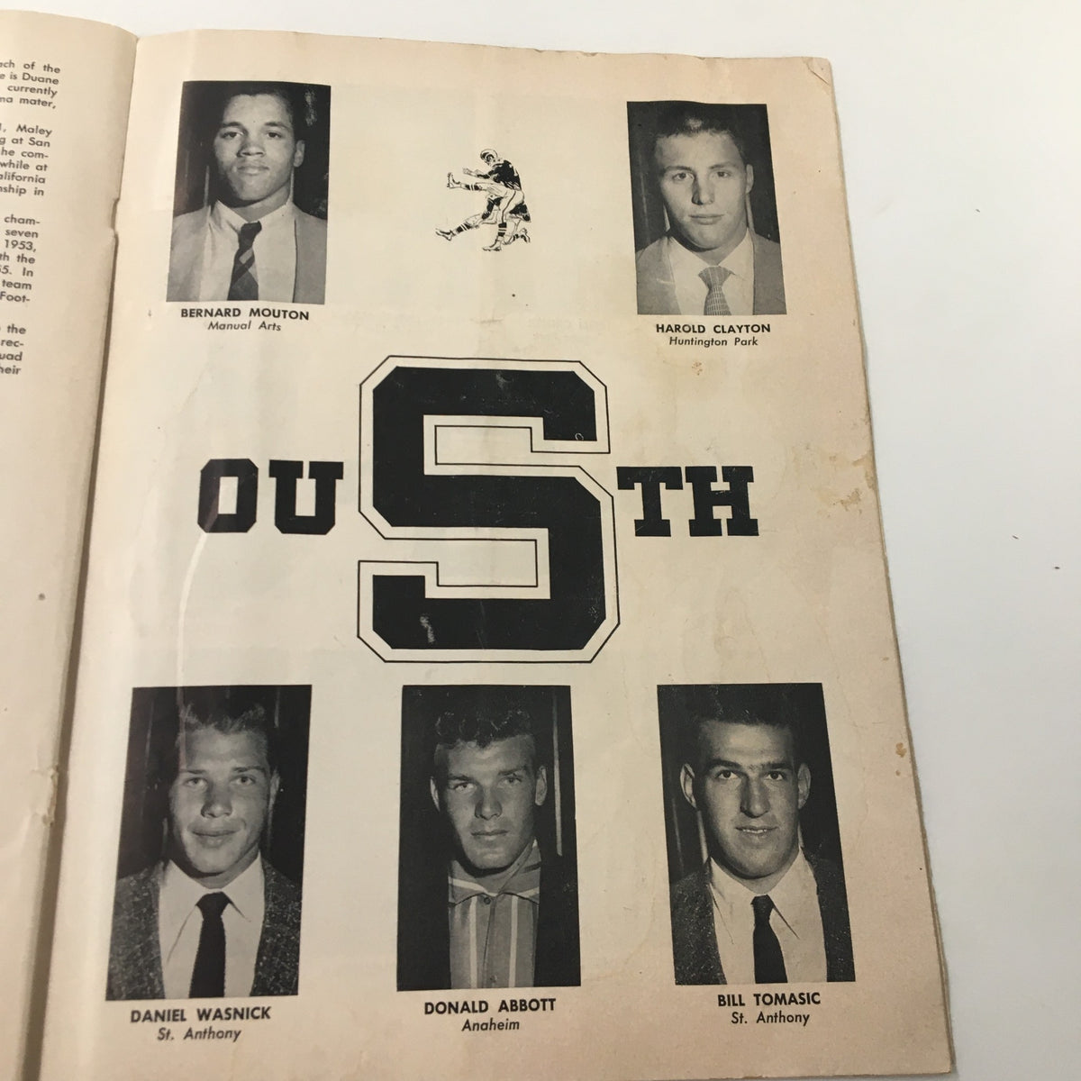 Group of student athletes depicted in the 1956 NCAA 5th Annual Shrine Football Game and Pageant Souvenir Program, featuring players from the South team.