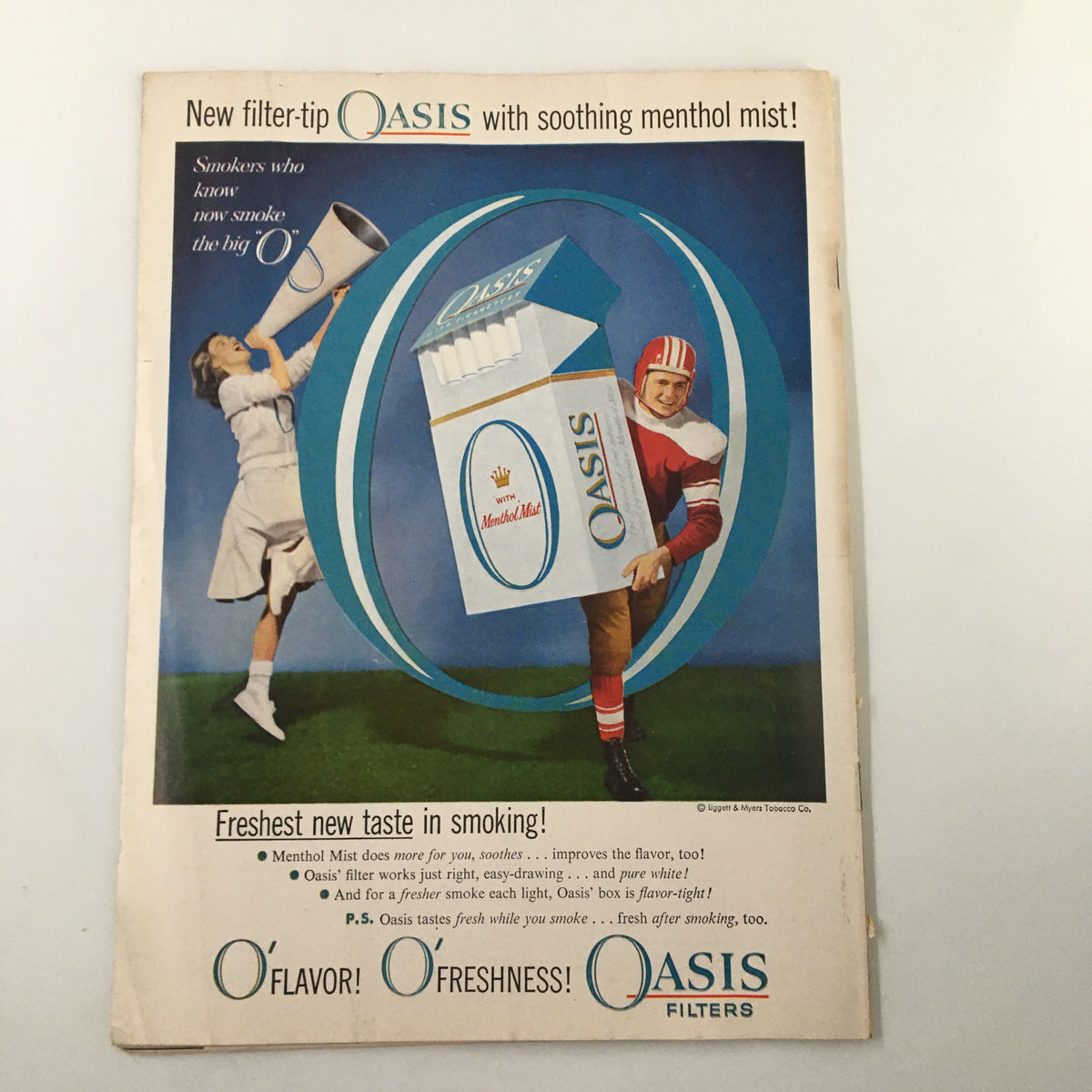 Vintage advertisement for Oasis filters cigarettes, highlighting the taste and marketing style of the era, from the time surrounding the October 19 1957 NCAA Football Oregon State Beavers vs UCLA Bruins.