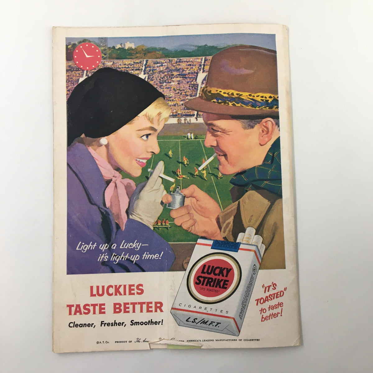Another vintage advertisement for Lucky Strike cigarettes, depicting a couple enjoying a game at the NCAA football event on September 16, 1955.