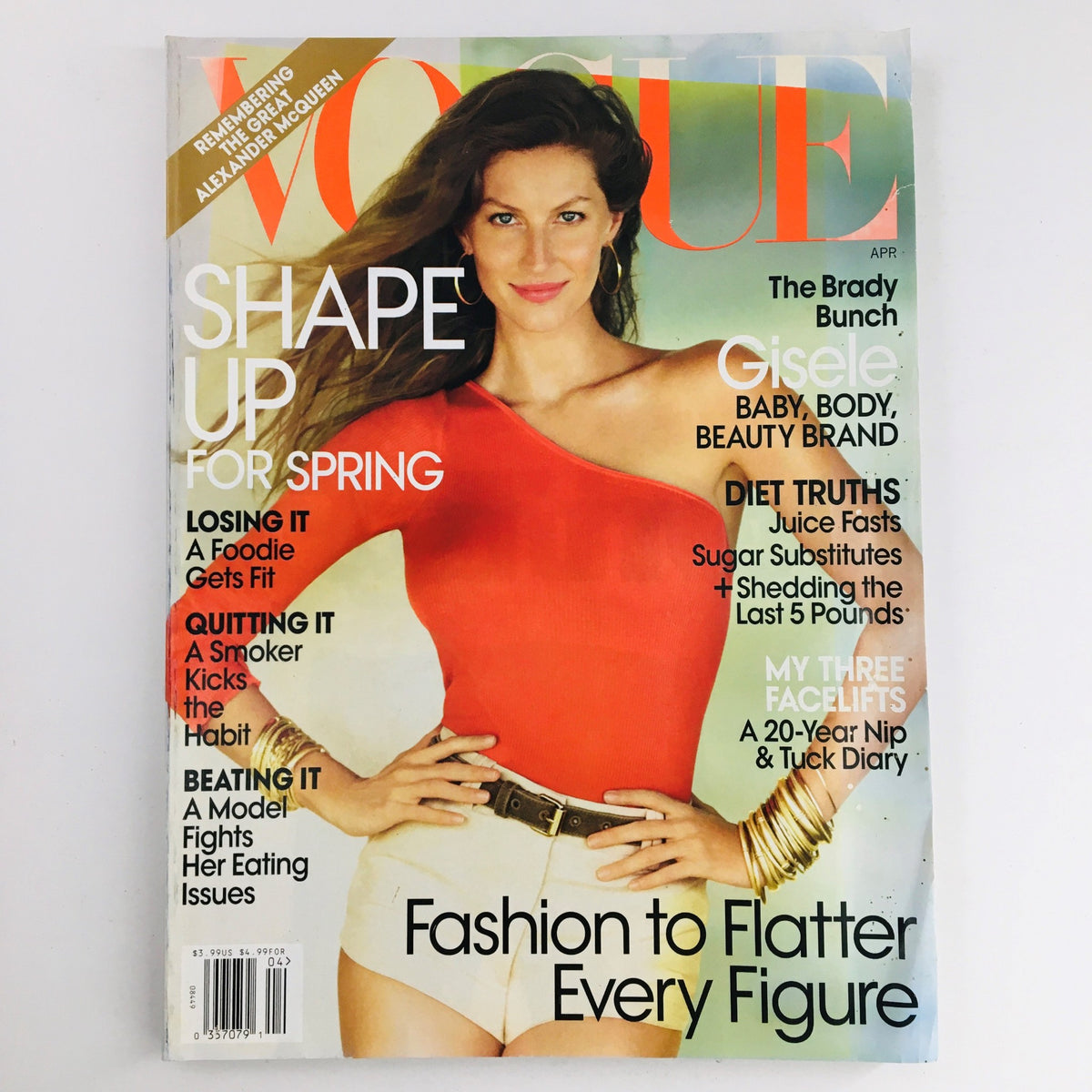 Vogue Magazine April 2010 cover featuring Brazilian model Gisele Bündchen, showcasing fashion and beauty with a vibrant design.