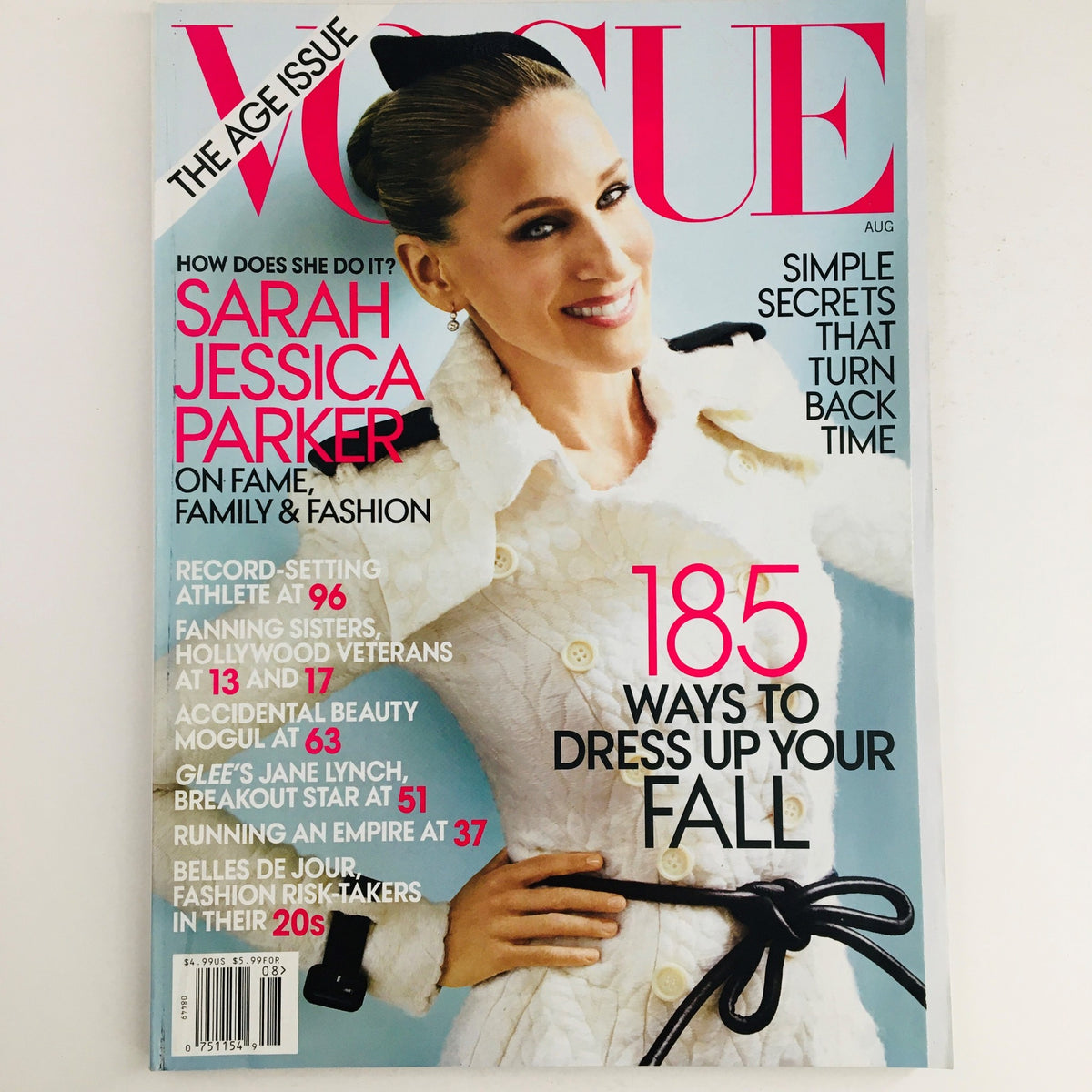 Cover of Vogue Magazine August 2011 featuring American actress Sarah Jessica Parker, highlighting fashion and cultural themes. This vintage issue is in Very Good to Excellent condition, ideal for collectors.