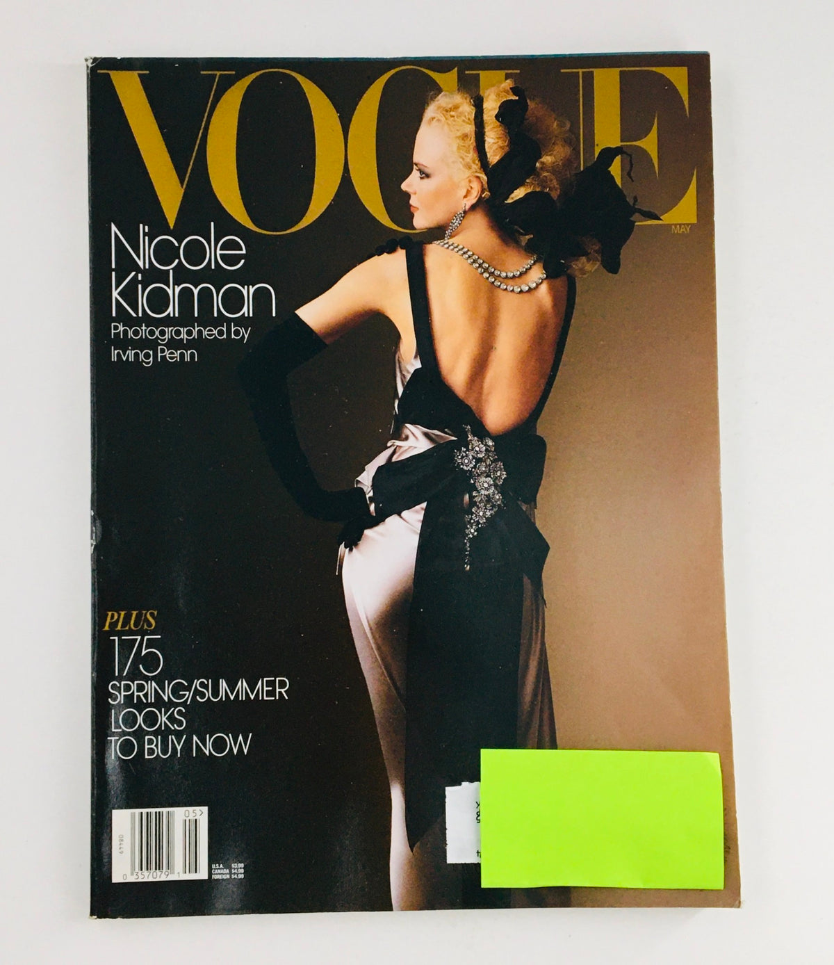 Cover of Vogue Magazine May 2004 featuring Australian actress Nicole Kidman, photographed by Irving Penn, showcasing elegance and fashion in a vintage magazine collectible.