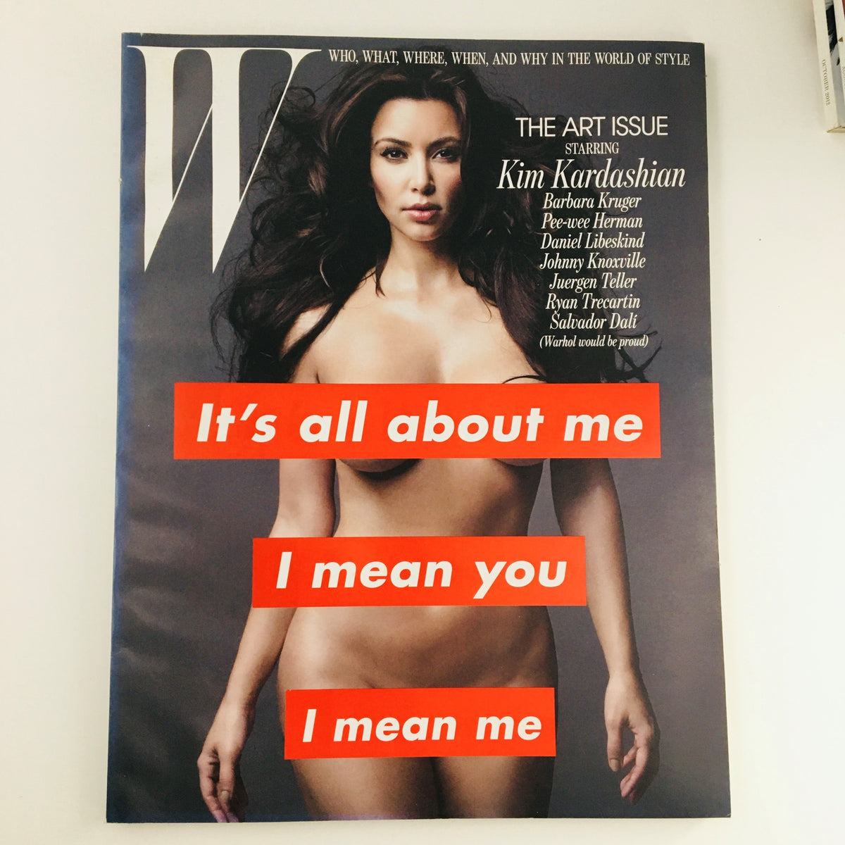 W Magazine November 2010 featuring socialite Kim Kardashian on the cover as part of The Art Issue. The cover text reads 'It's all about me I mean you I mean me,' highlighting Kim's influence in pop culture.