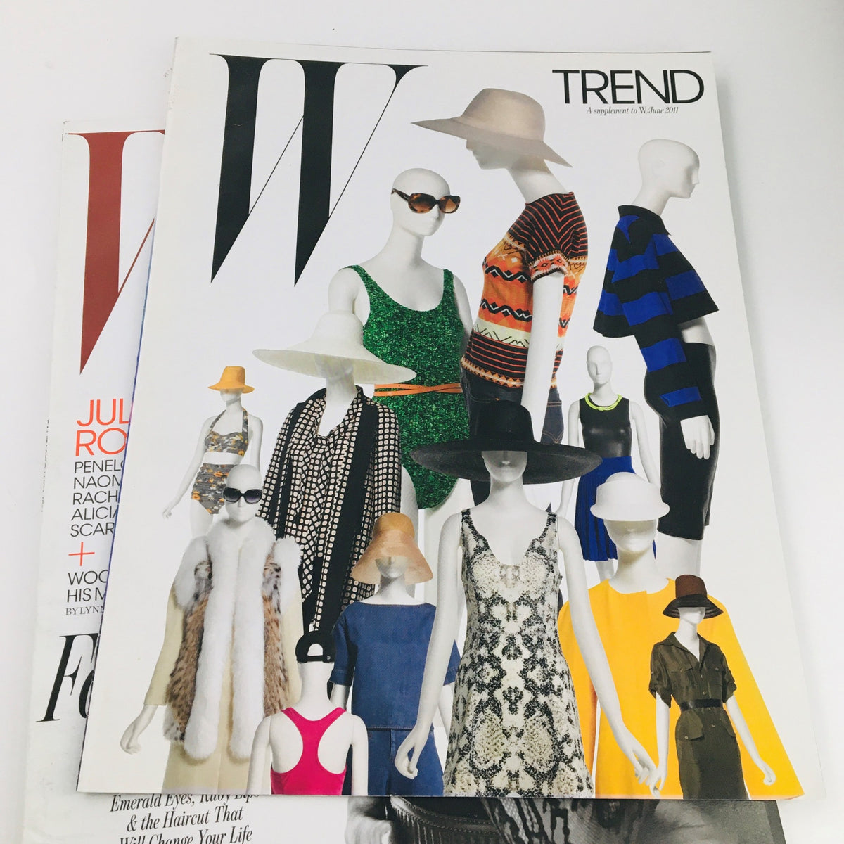 W Magazine TREND issue displaying diverse fashion styles with stylish mannequins, complementing the vintage allure of the June 2011 issue featuring Julia Roberts and Tom Hanks.