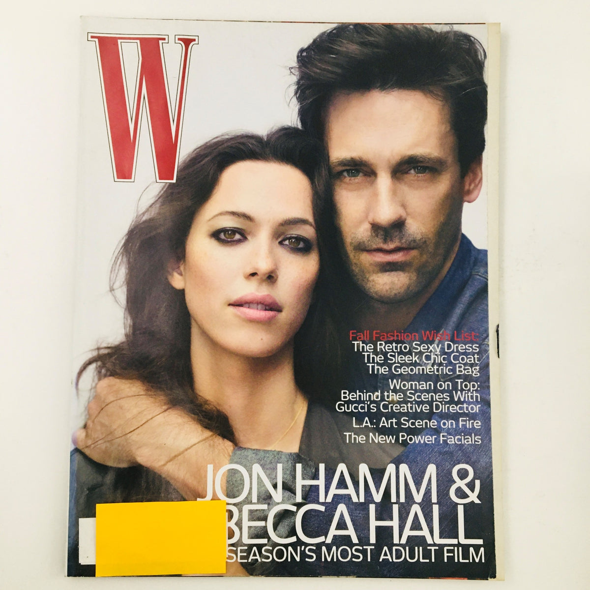 W Magazine August 2010 cover featuring actors Jon Hamm and Becca Hall, showcasing Fall's finest fashion trends with an address label affixed to the front.